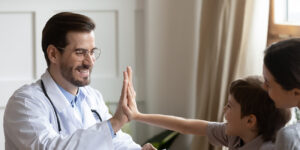 banner-young-doctor-high-five